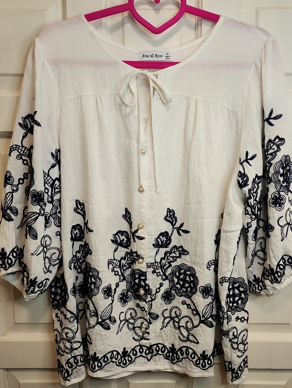 ANA & ROSE White Peasant Blouse with Navy Floral Embroidery Tie Neck